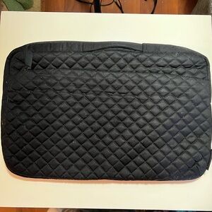 Vera Bradley laptop/tablet sleeve in a black diamond quilt pattern. Zip top.
